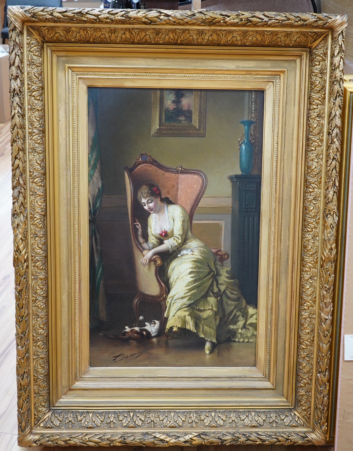 Louis Francois Desmarest (French, 1814-1882), oil on canvas, Interior scene with seated lady and cat, signed, 68 x 42cm, ornate gilt frame. Condition - good, some very minor craquelure, Provenance - Sothebys Billingshurs